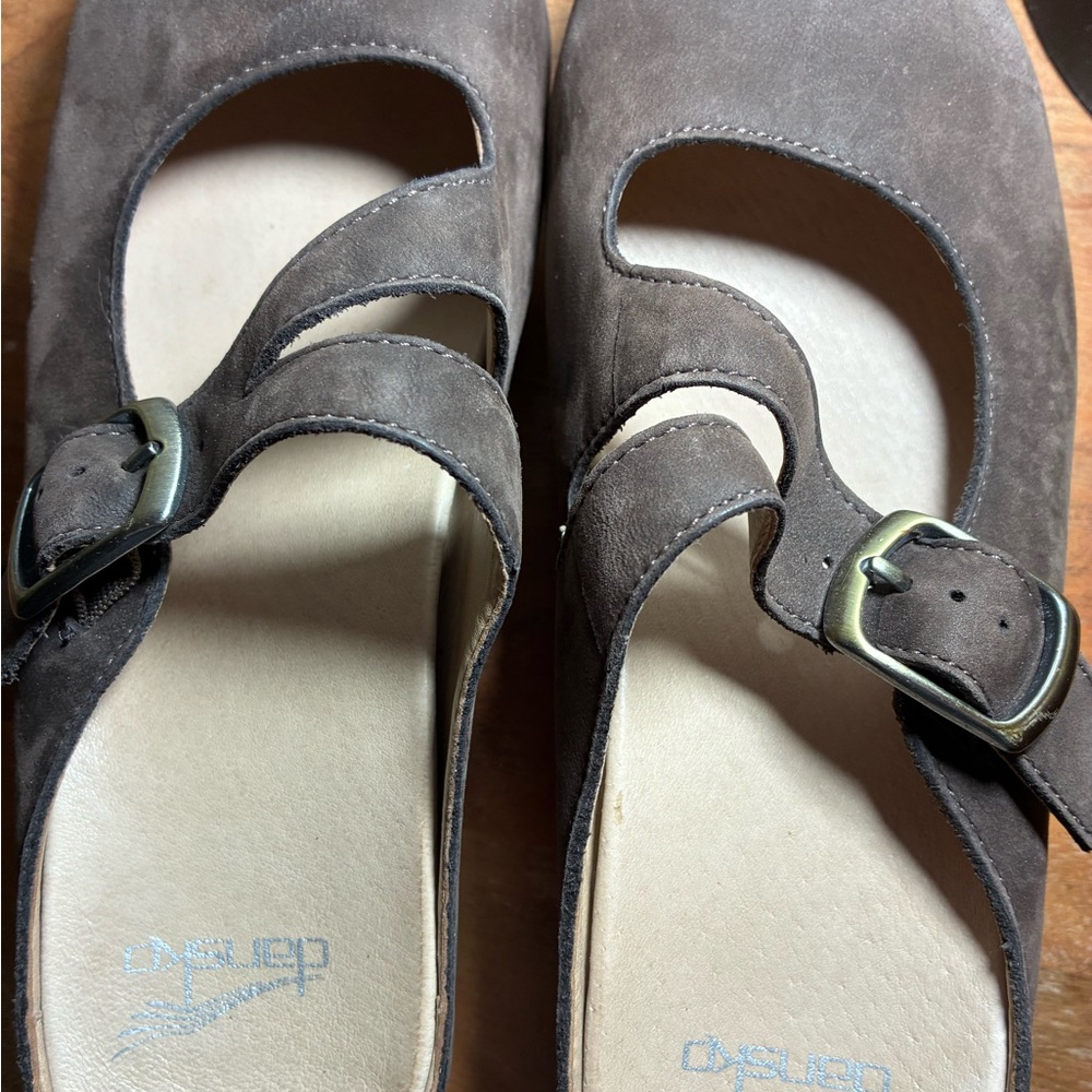 Brown Suede Dansko mules.